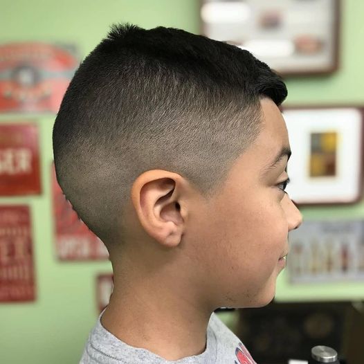 High fade with defined edges and tight neckline, men’s haircut Campbell California.